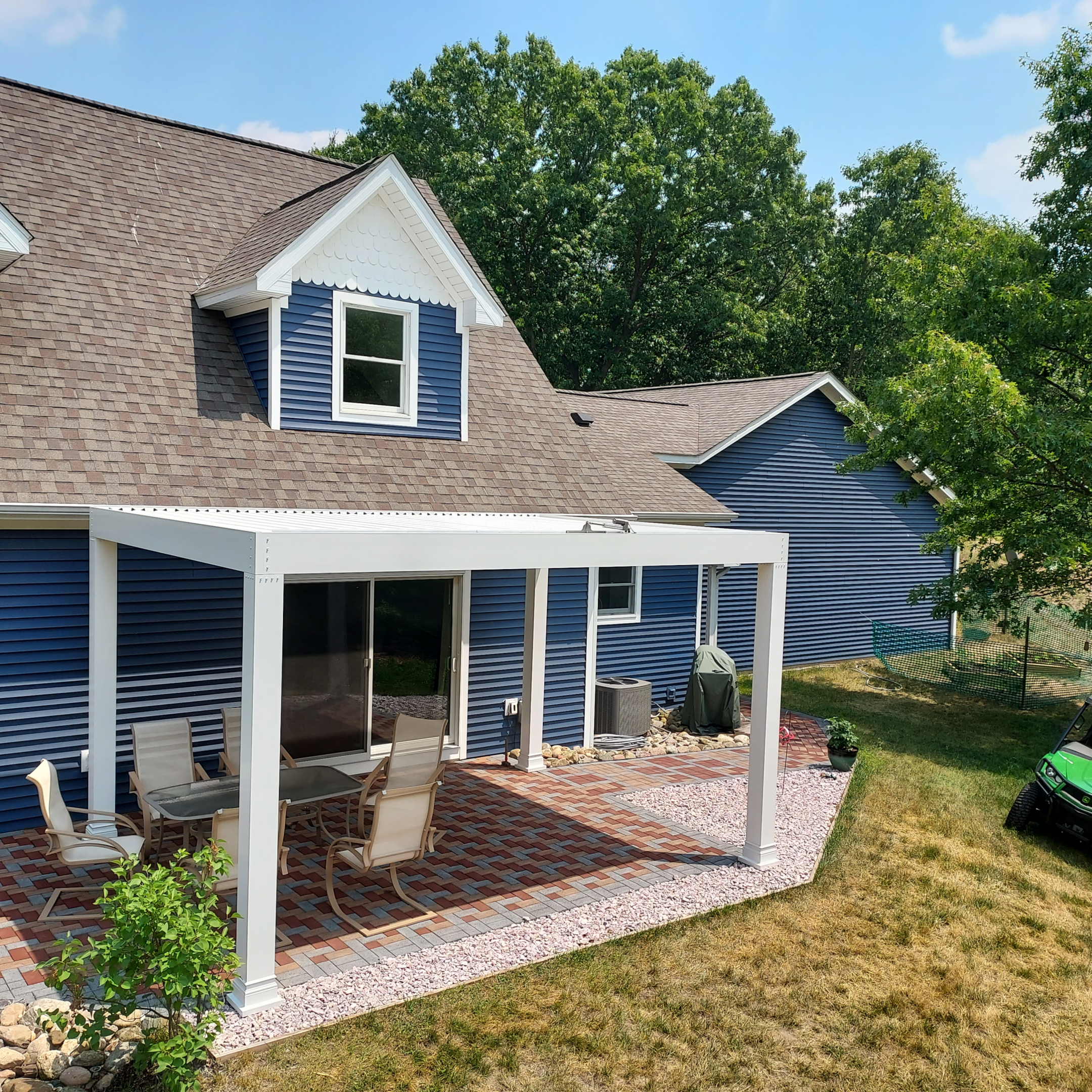 Pergola roof giving shade to patio space from sun