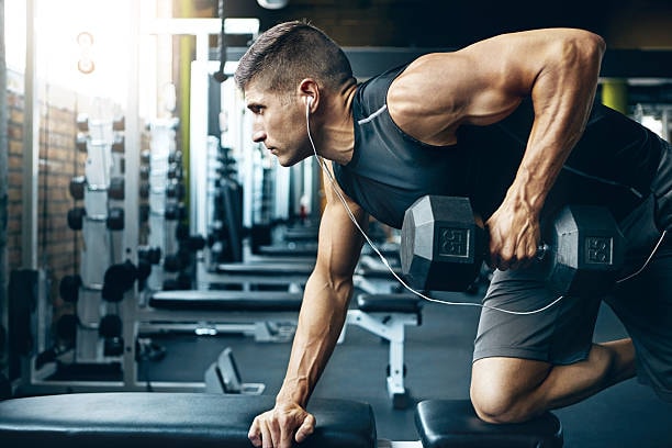 Person having fun beginning their dumbbell workout