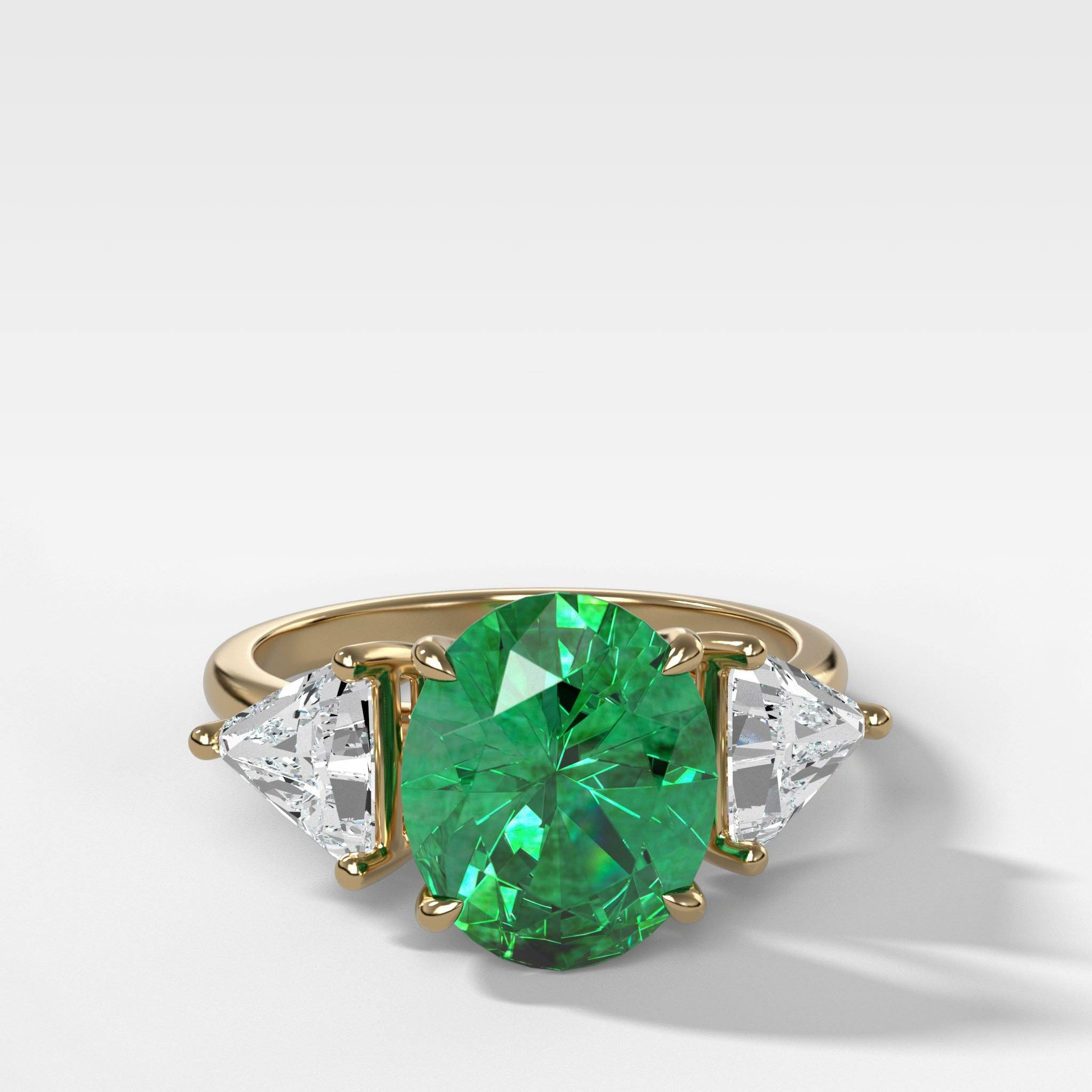 GOODSTONE Oval Cut Emerald Three Stone Engagement Ring With Trilliant Cut Diamond Sides