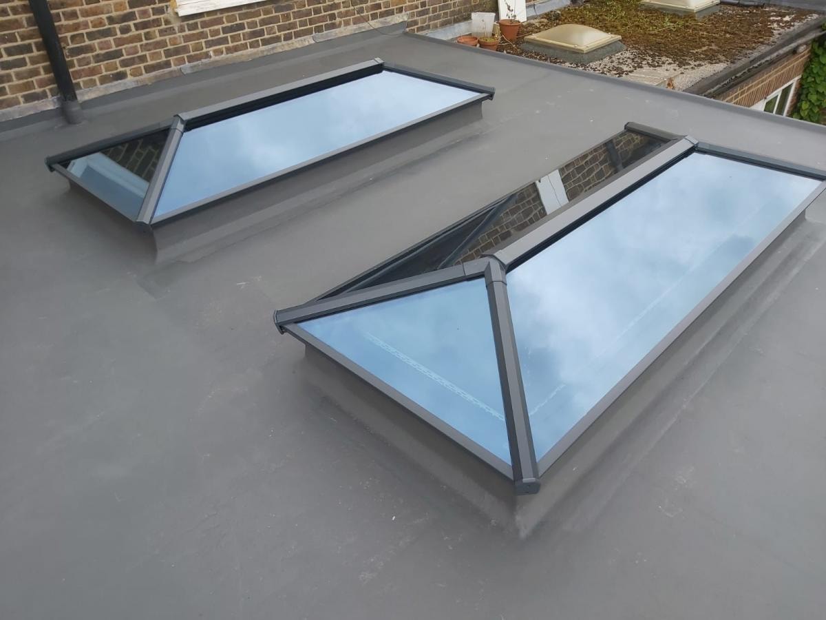 two roof lanterns on flat roof extension