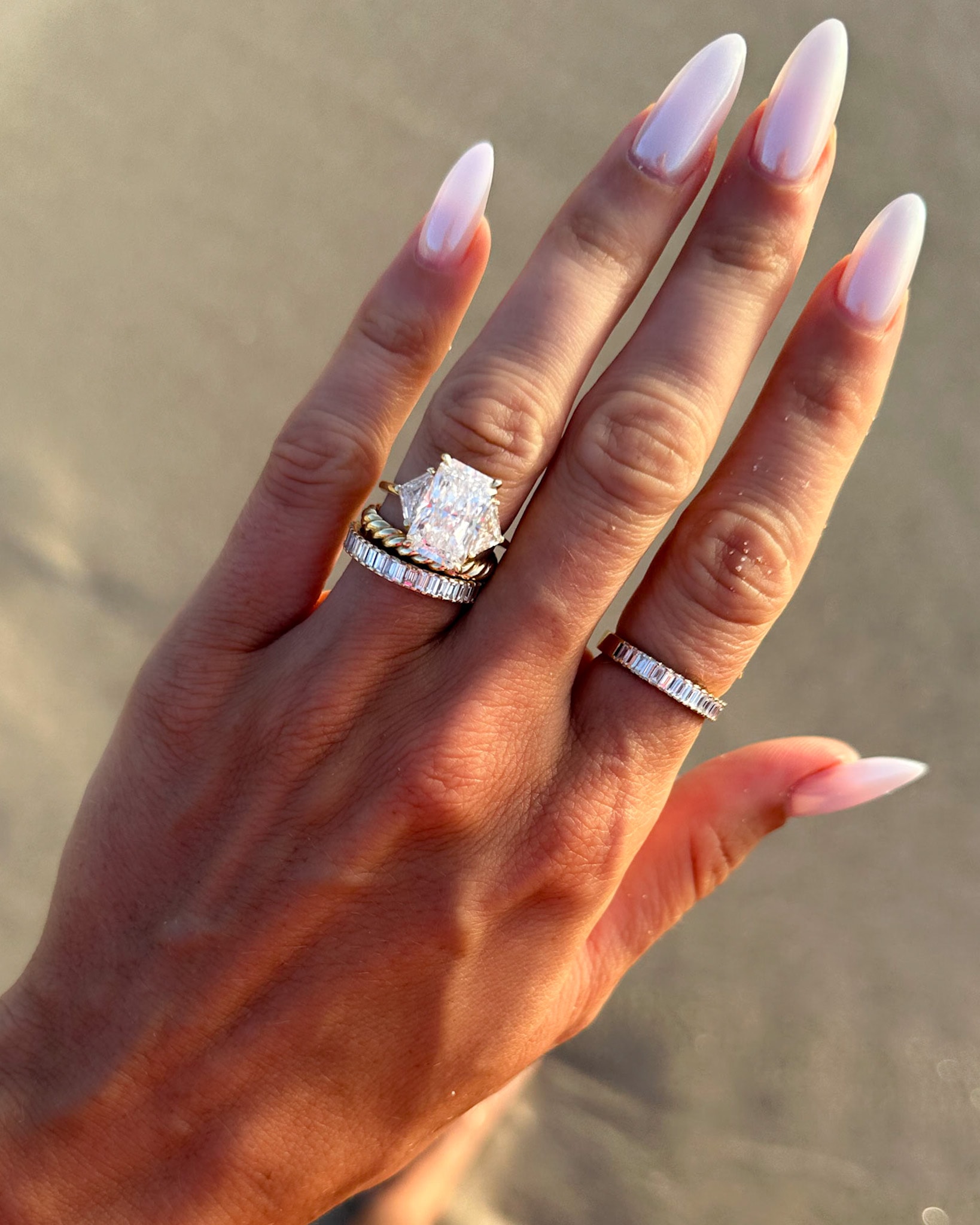 GOODSTONE Three Stone Engagement Ring with Shield Side Stones and a Radiant cut Diamond