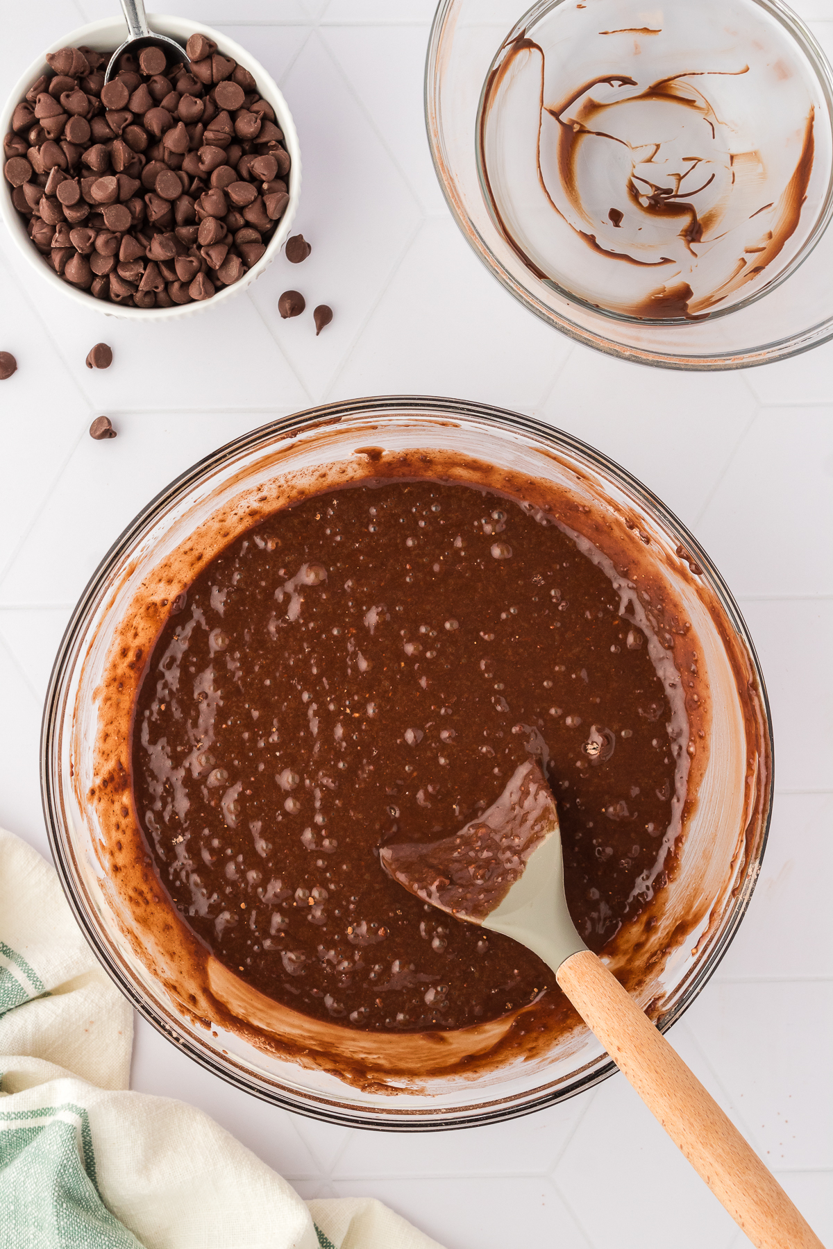 chocolate bread batter in bowl with spoon