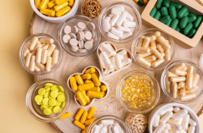 An illustration depicting various vitamins and their absorption process in the body.