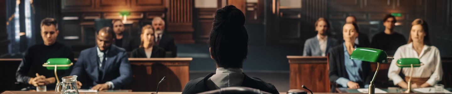 A courtroom scene with a law book and gavel, referring to a personal injury case.