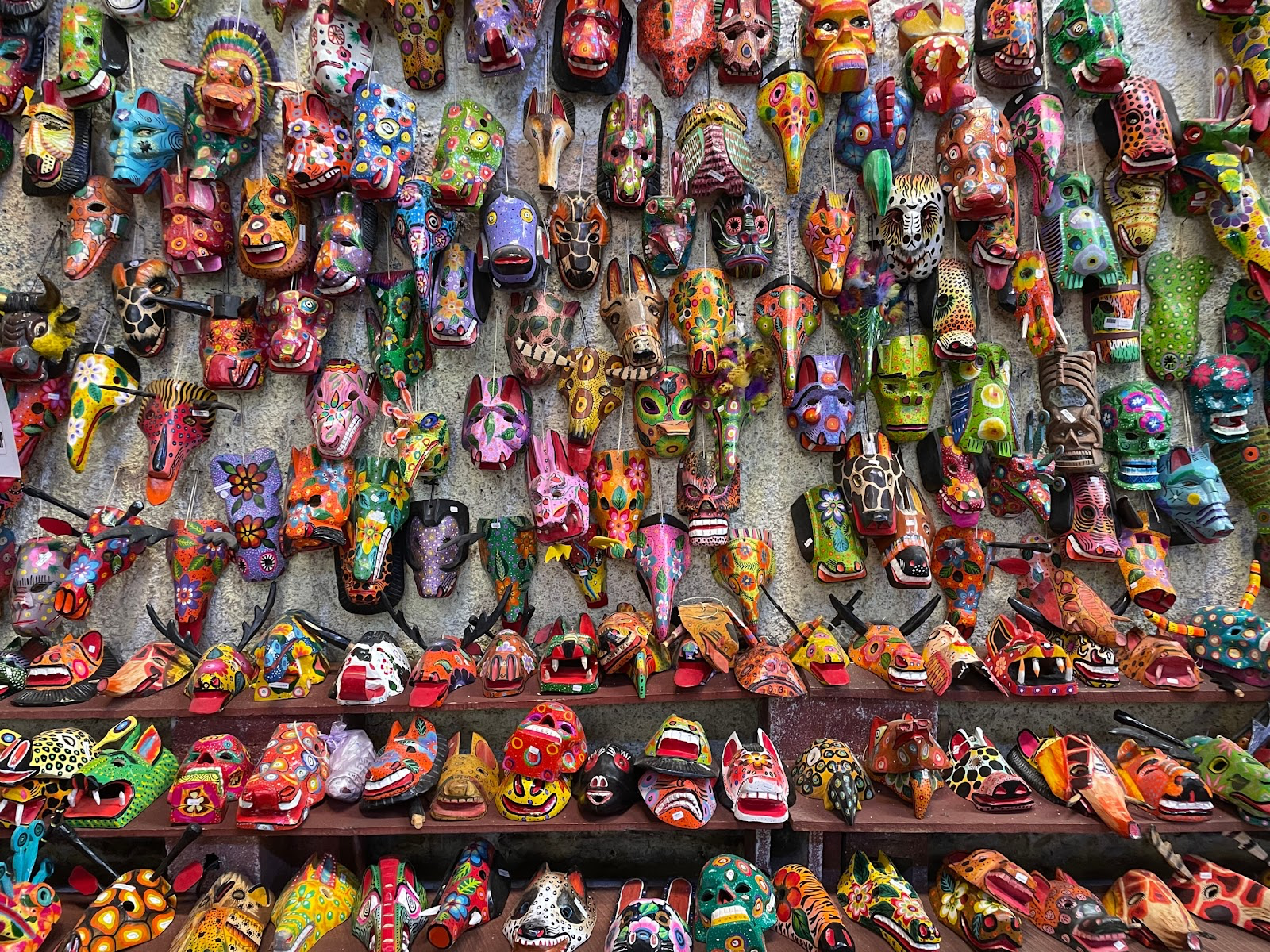 Colorful masks for sale in a market in Antigua