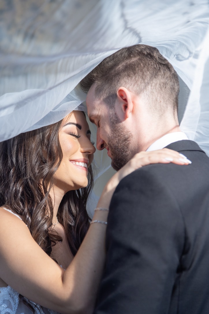 A young photographer capturing a wedding moment.