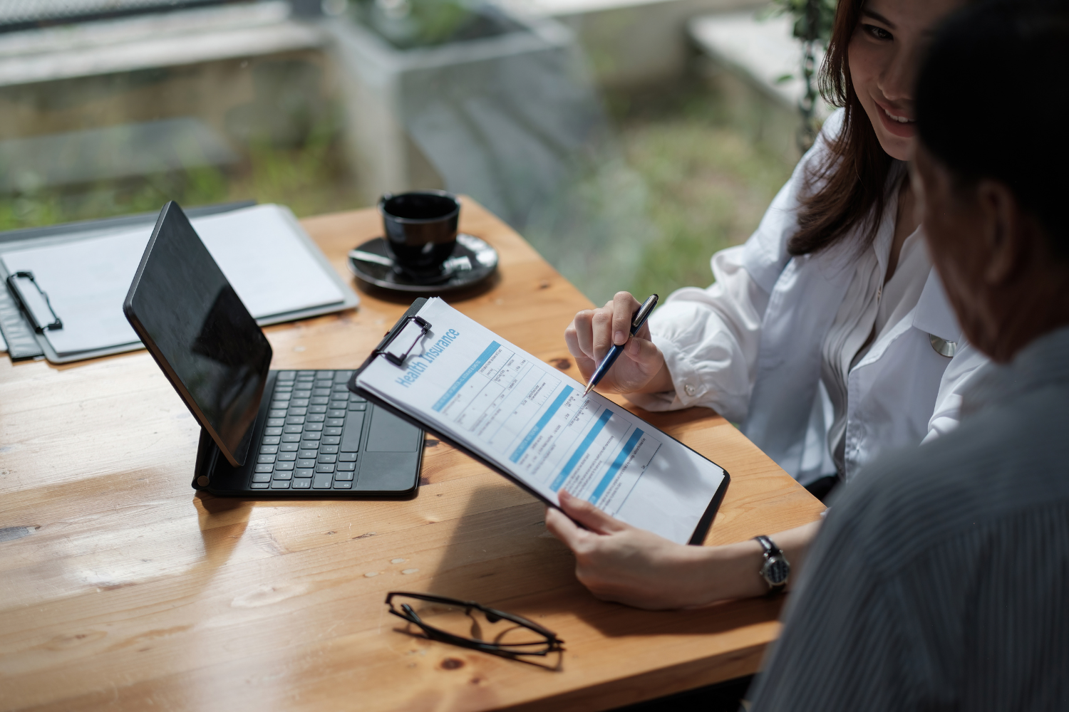 Trustworthy business broker with a business owner.