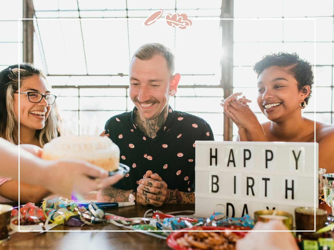 Birthday Wish for Boyfriend – friends celebrate with cake, confetti and a “Happy Birthday” lightbox in a bright party setting