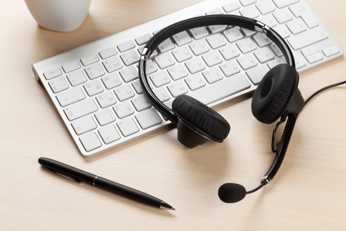 Headset and keyboard ready for a remote interview setup