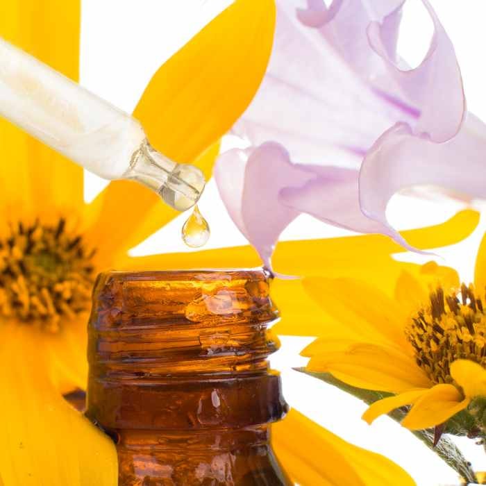 Dropper bottle with flowers, showcasing Bach Flower Remedies for anxiety and depression.