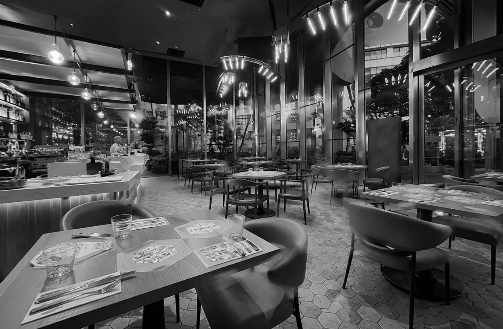 Modern interior of Sol & Luna restaurant with elegant lighting and spacious dining area.