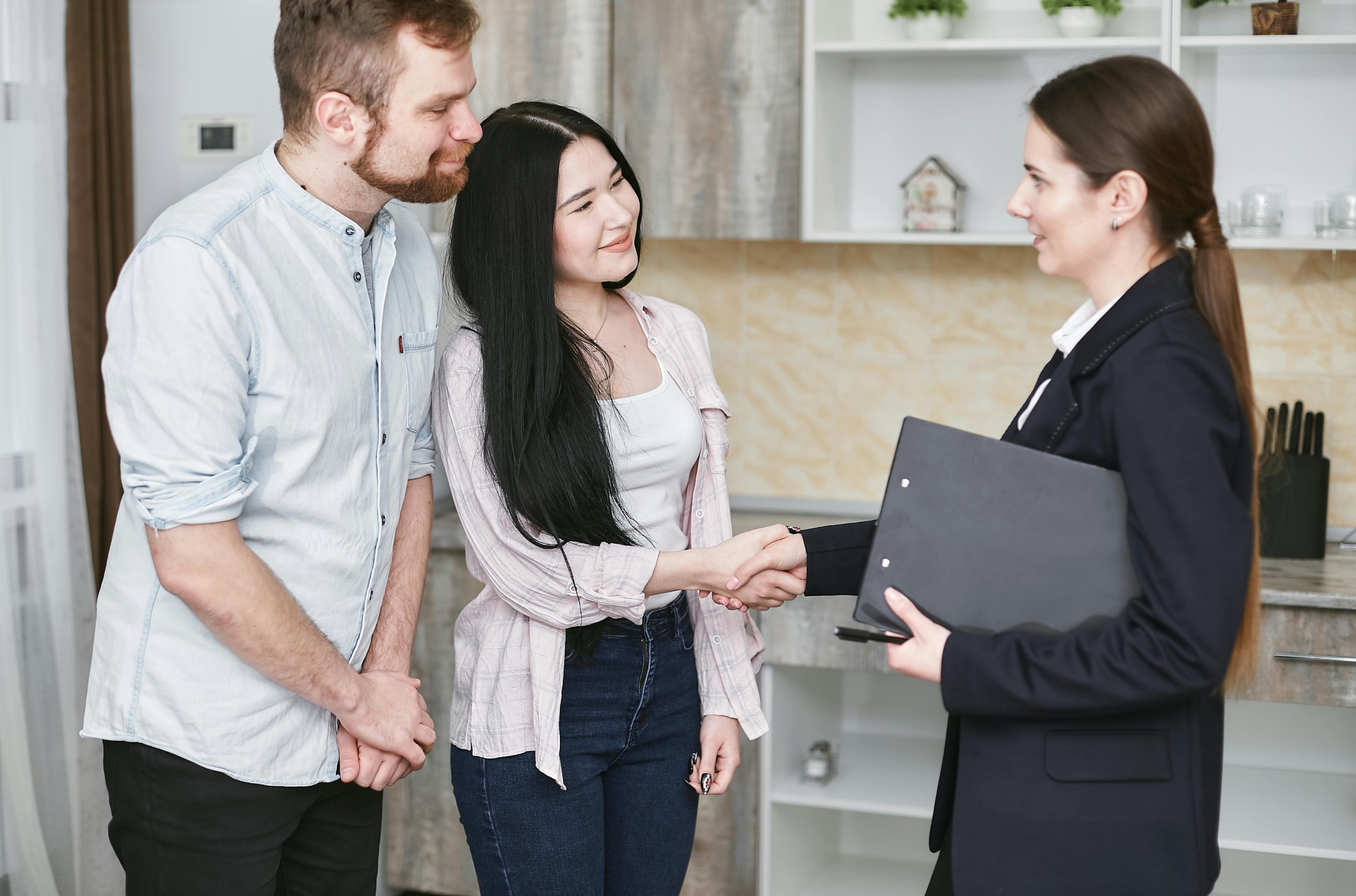 Real estate investor meets with home sellers found through Notice of Default lead.