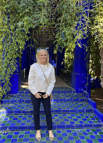 Standing along colorful path at Majorelle Gardens, Marrakech