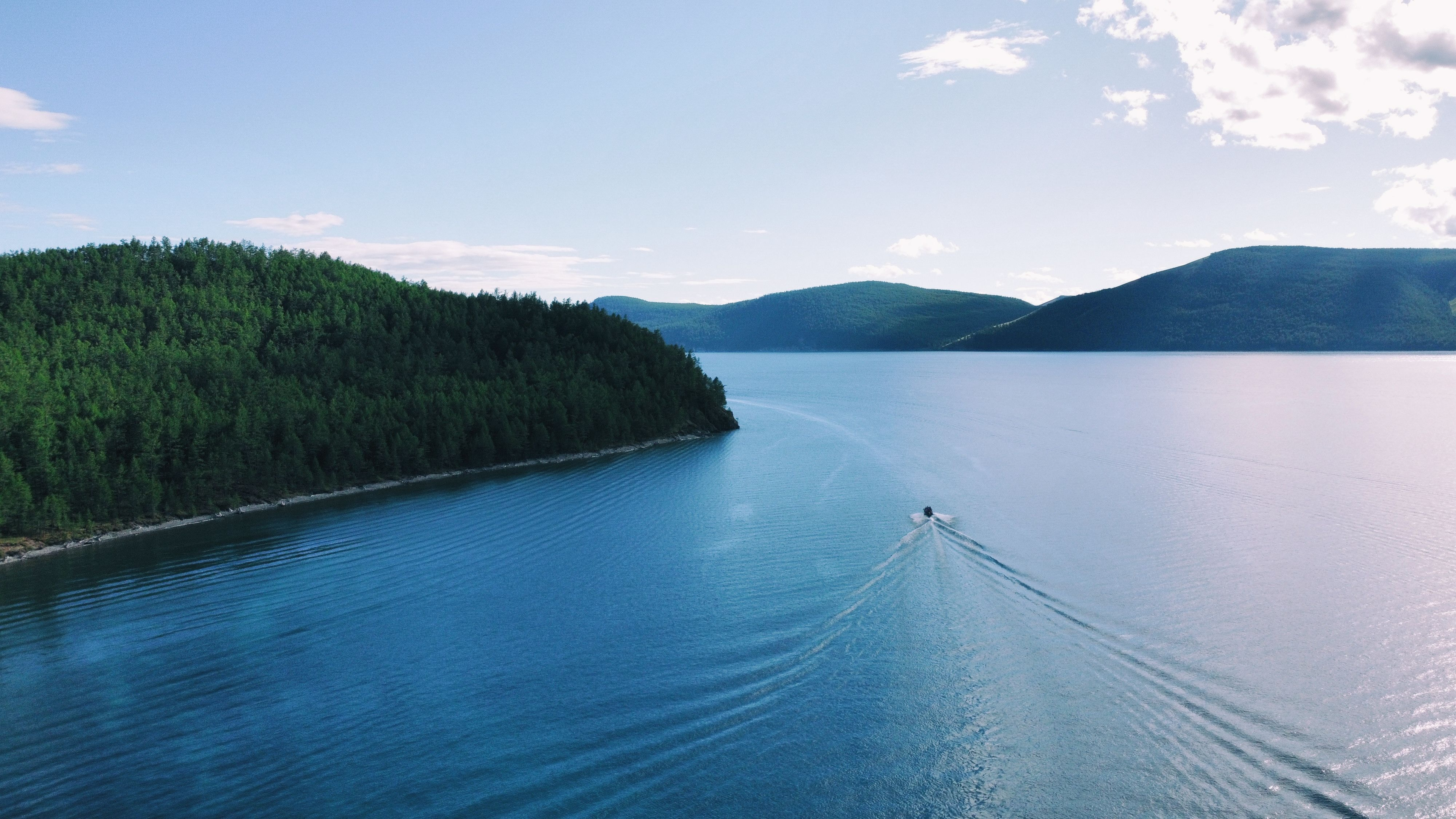 Taking a boat ride up the western shores to the National Park on Lake Khuvsgul