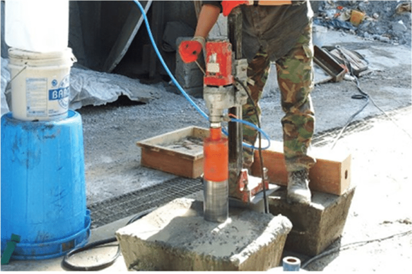 An image showing the process of extracting and preparing concrete cores for testing in accordance with concrete core testing procedures.