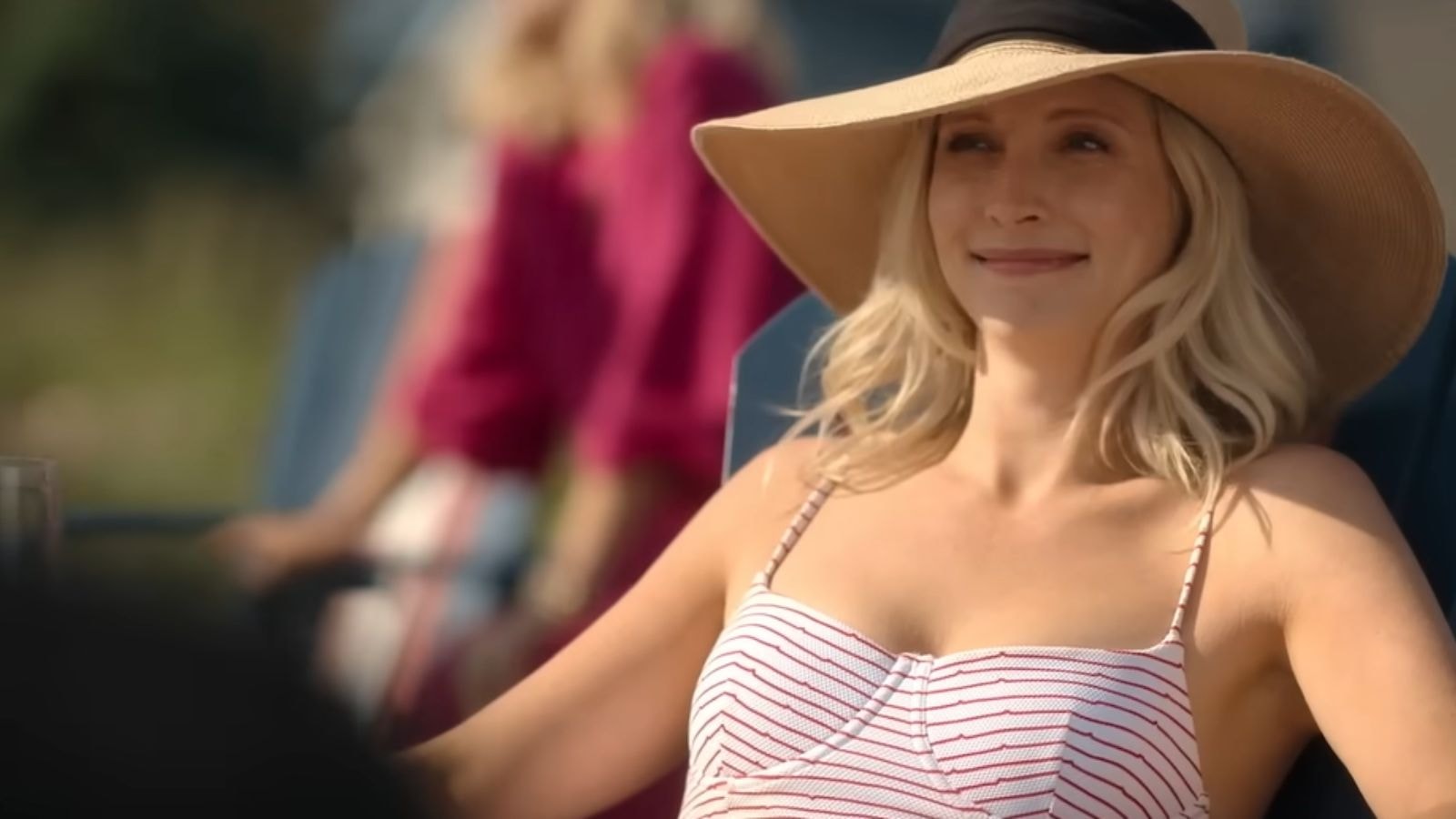Candice King as Bess relaxing outdoors in sun in We Were Liars Season 1
