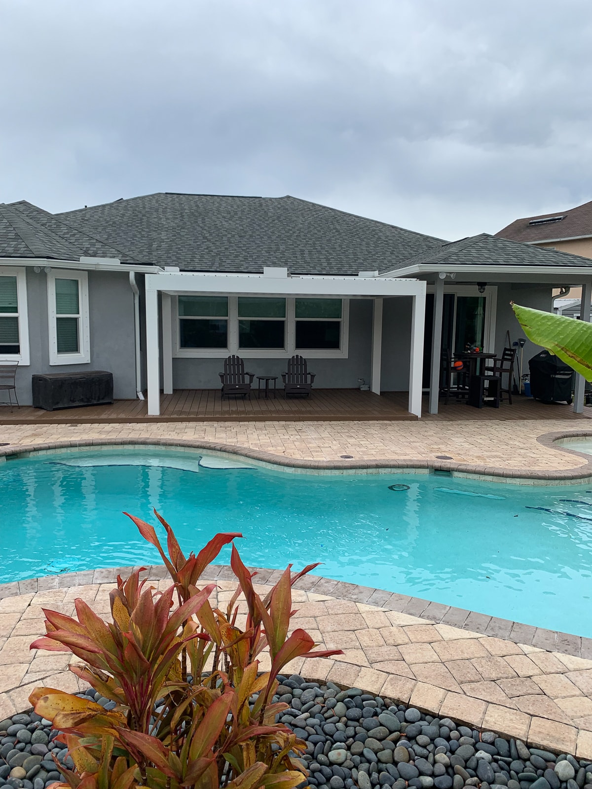 A simple structure by a pool adds nice ambiance to your backyard.