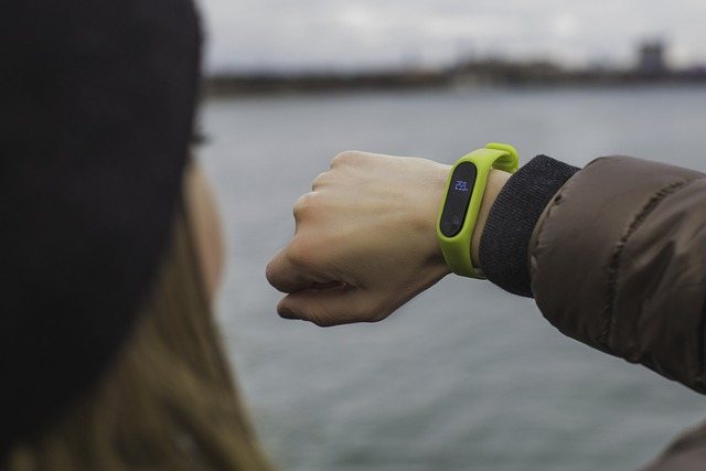 woman looks at fitness tracker showing how cognitive bias and other factors can hurt amazon's search results and stop people from paying attention