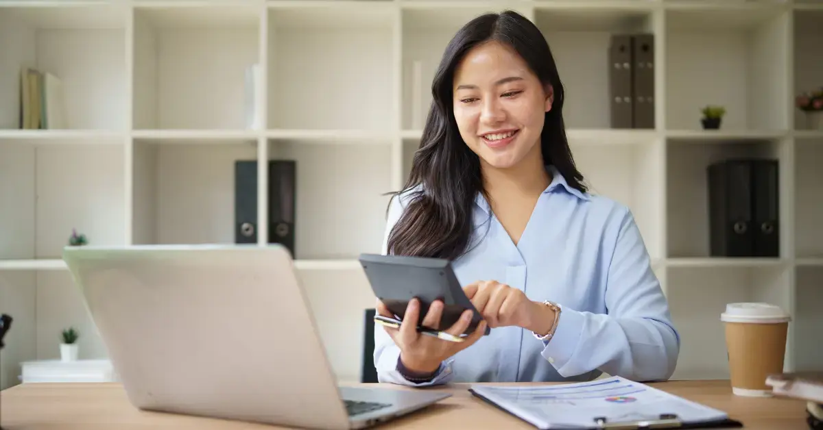 Woman managing business finances and using tax loopholes to reduce tax liability.