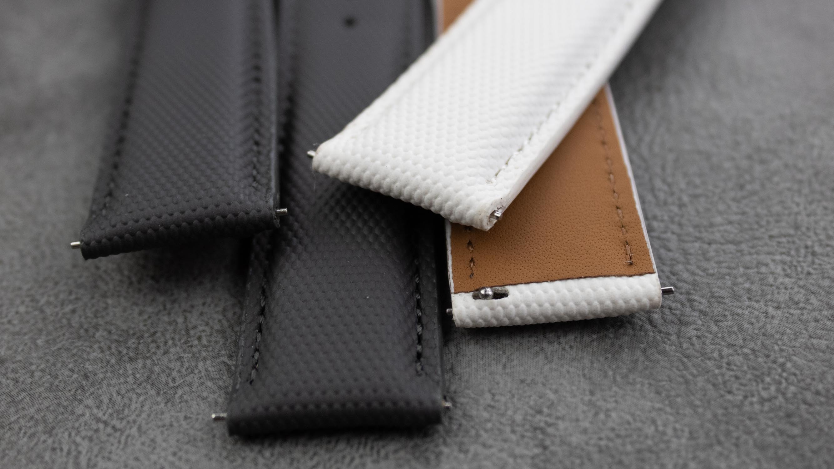 An assortment of genuine sailcloth materials used for watch straps.