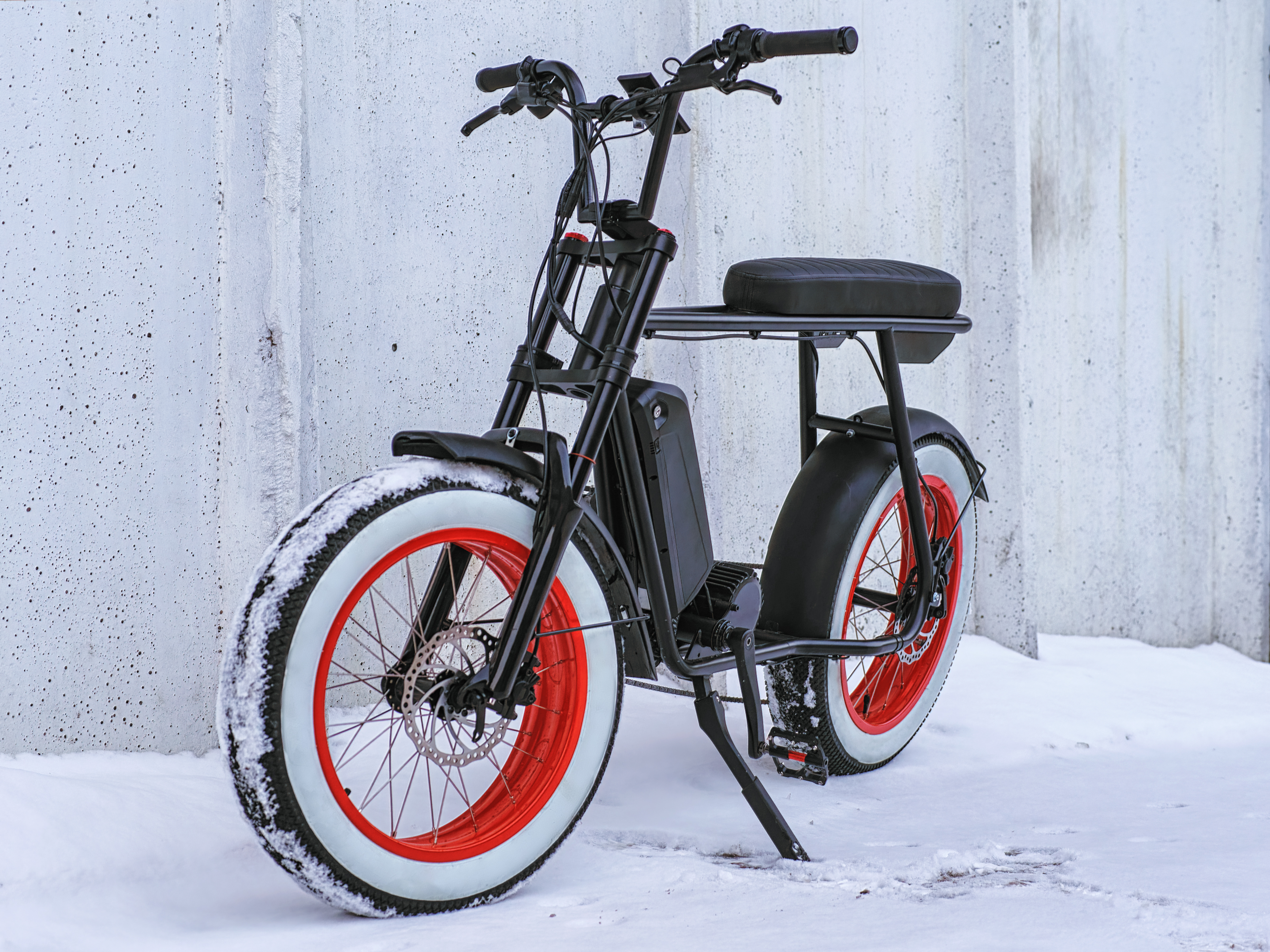A fat wheel electric bike with front suspension forks