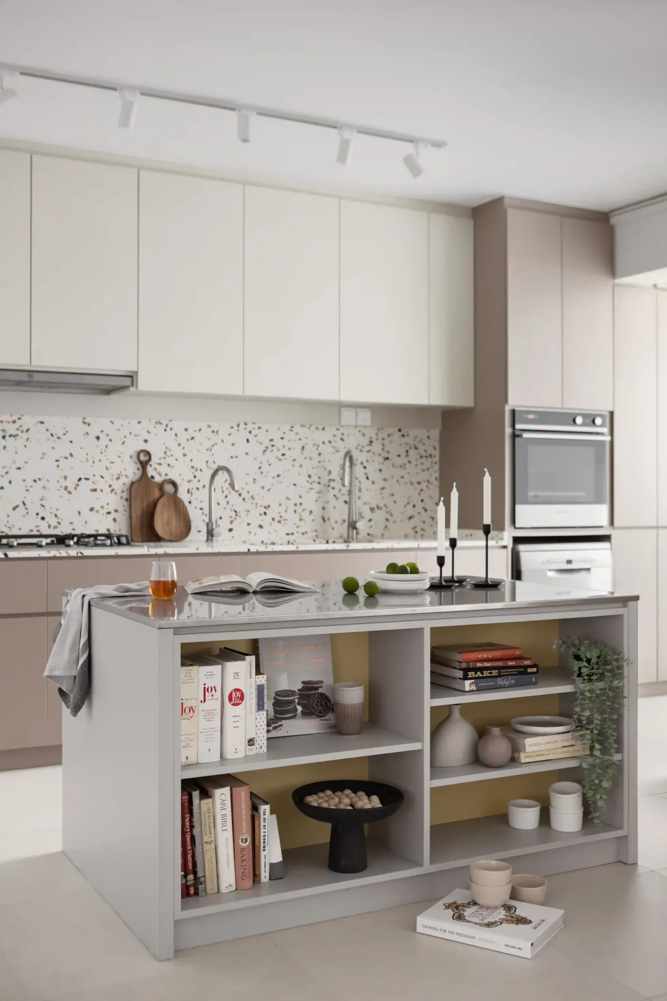 Contemporary kitchen designs with terrazzo backsplash, bookcase island and streamlined cabinetry in Singapore.