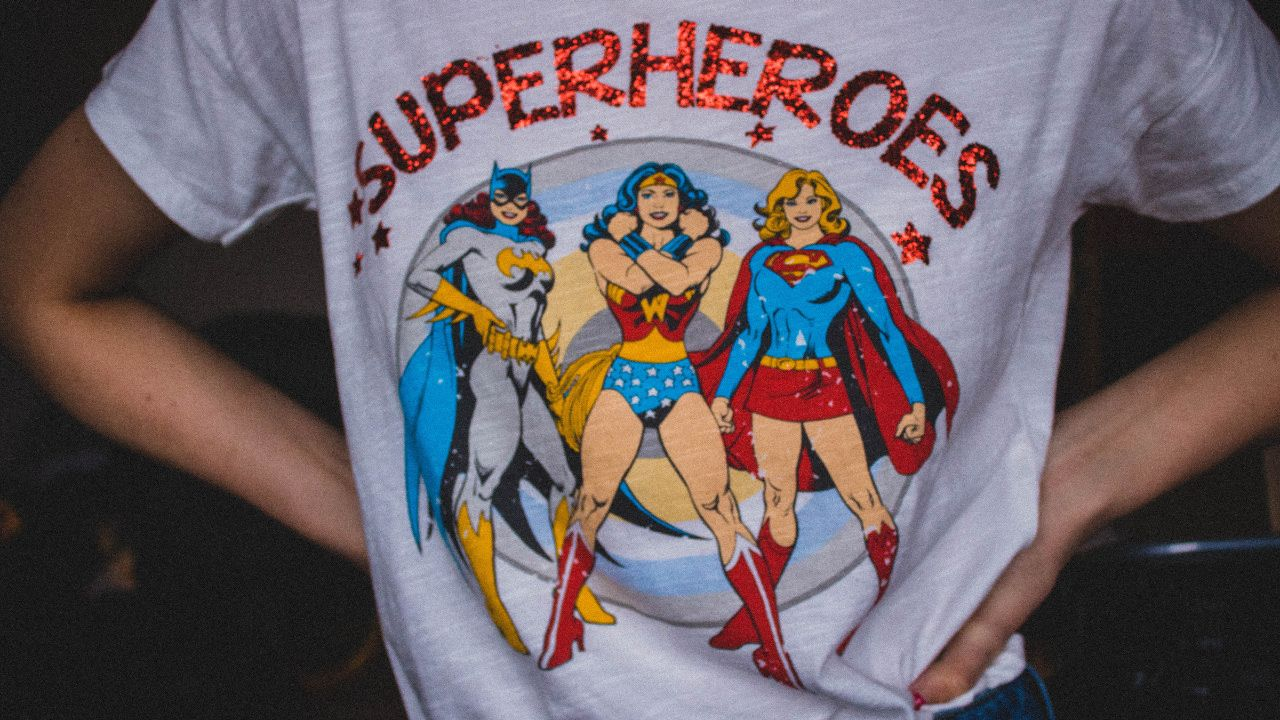 A group of people wearing t-shirts with custom print on demand designs