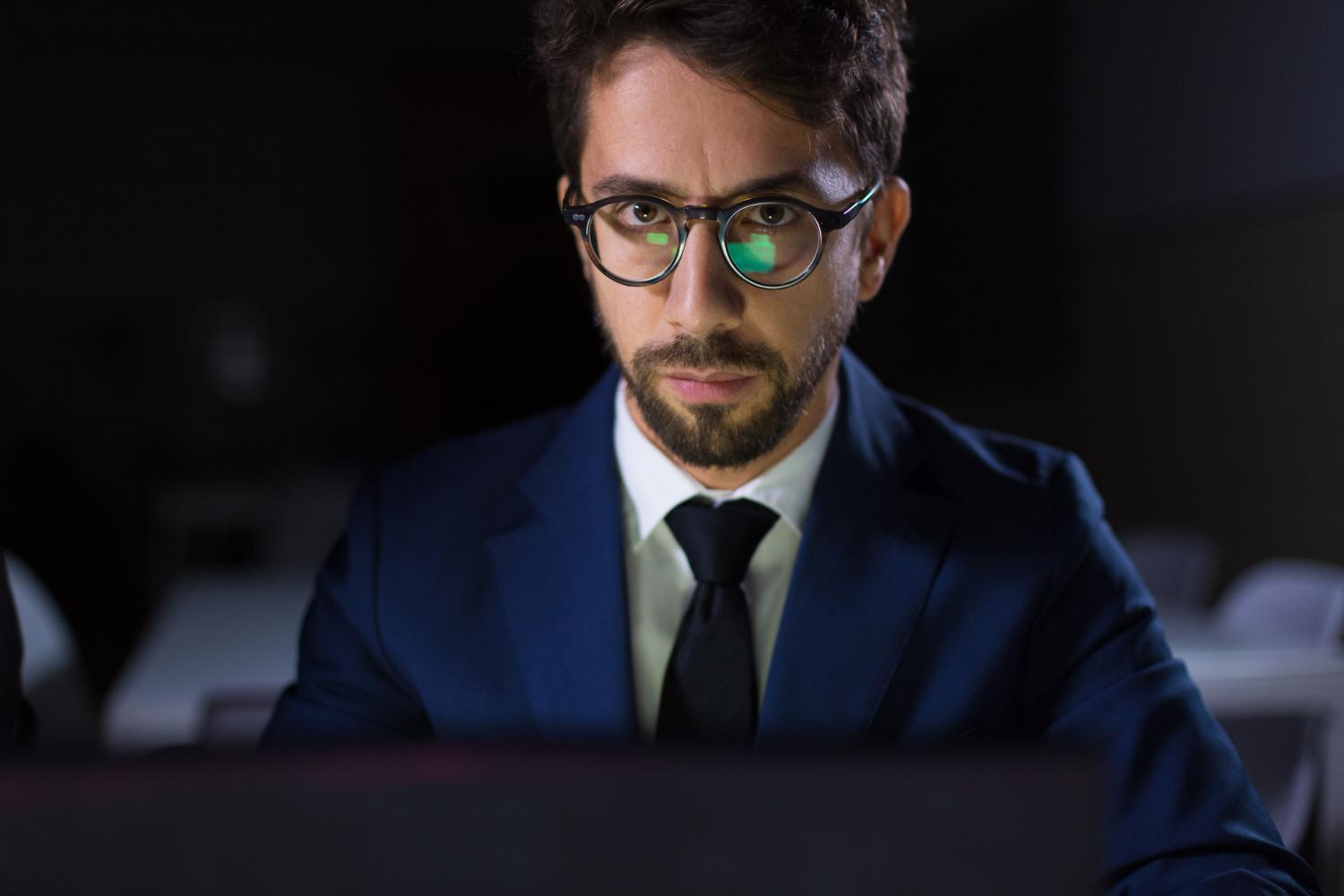 Man checking spy tools.