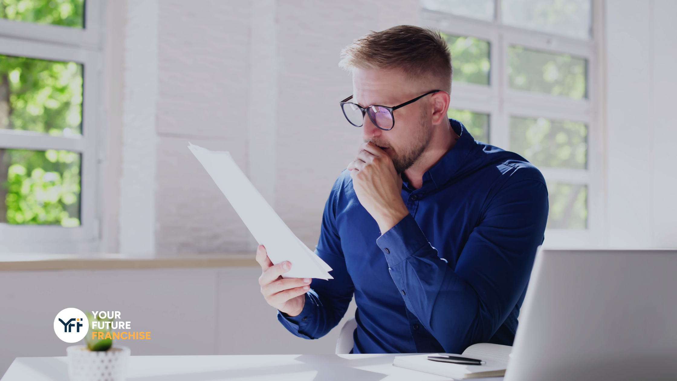 A man reading a document
