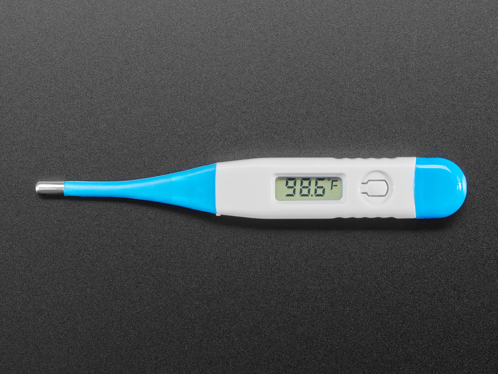 Digital thermometer displaying body temperature