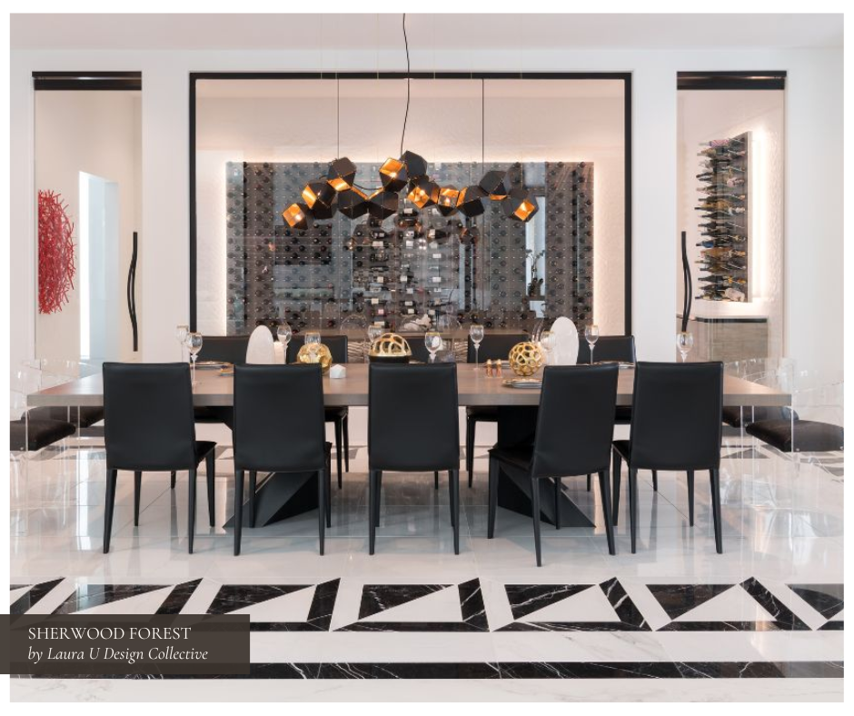 Dramatic black-and-white dining room with sculptural lighting, a modern black dining table, sleek leather chairs, and a glass-enclosed wine display wall, set atop bold patterned flooring for a high-contrast, high-glam look.