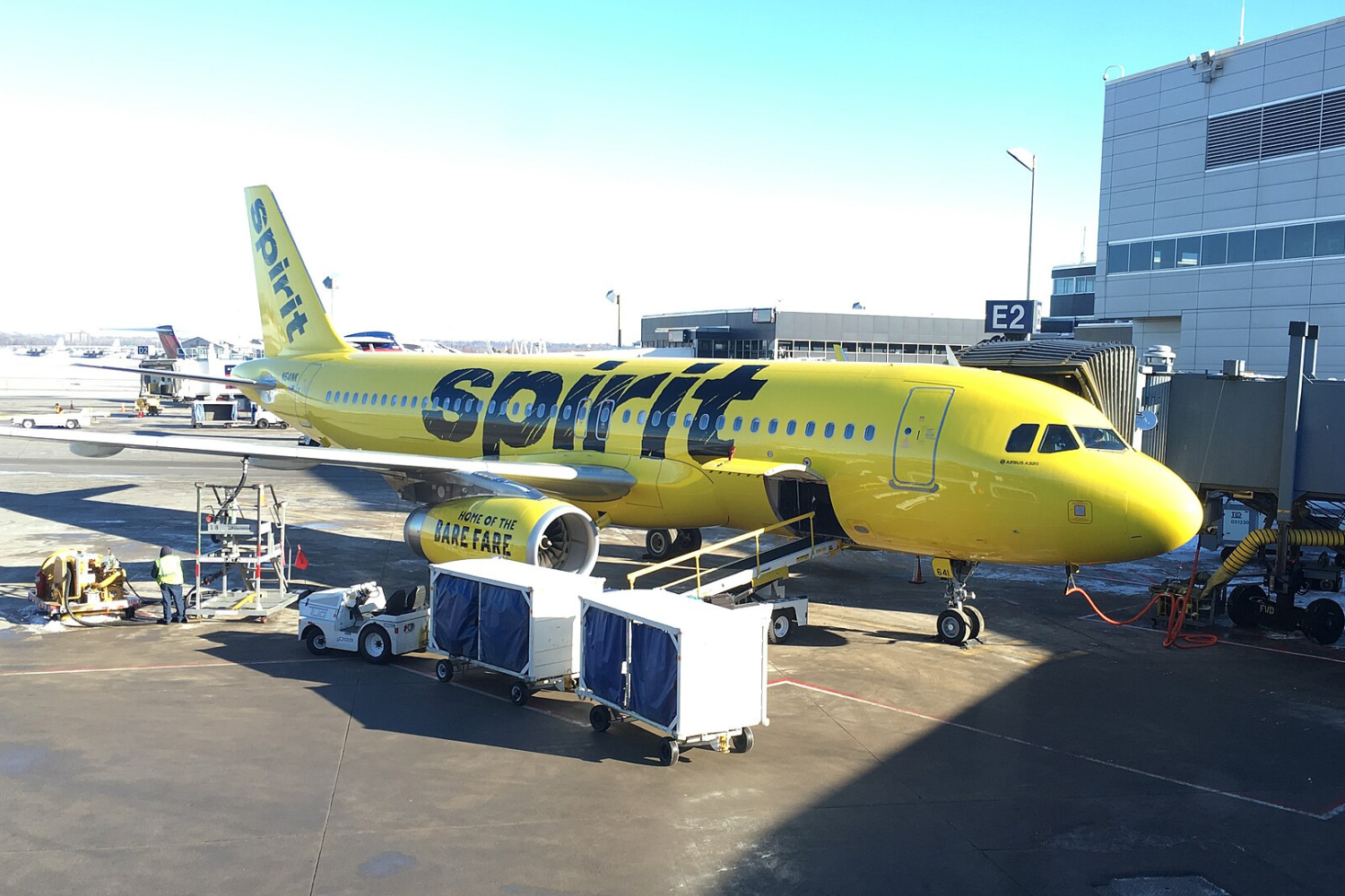 yellow spirit flight at airport