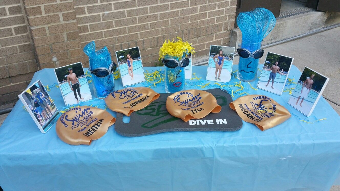 Display all of the awards and career highlights of your swimmer on a senior table. Image from Pinterest.com