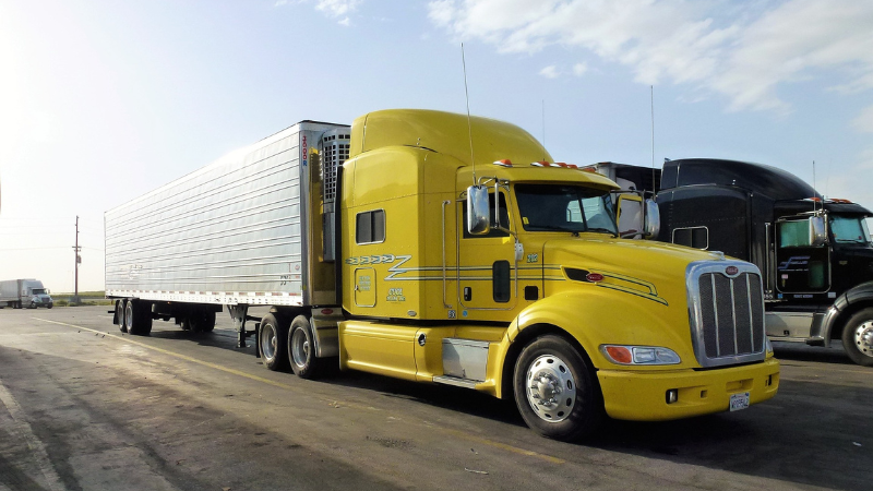 a yellow-wraped truck