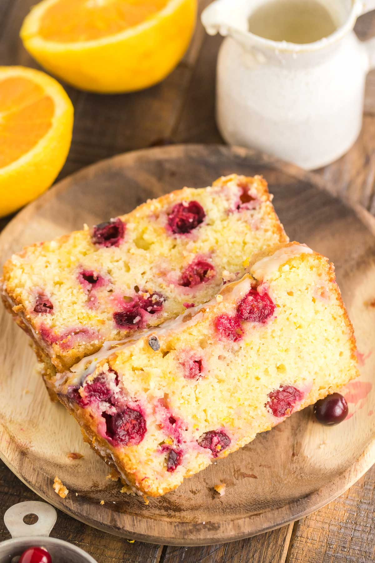 two slices of cranberry orange bread on a plate