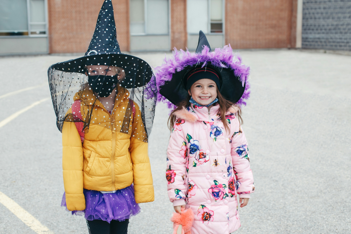 Funny kids' Halloween costumes at a festive event.