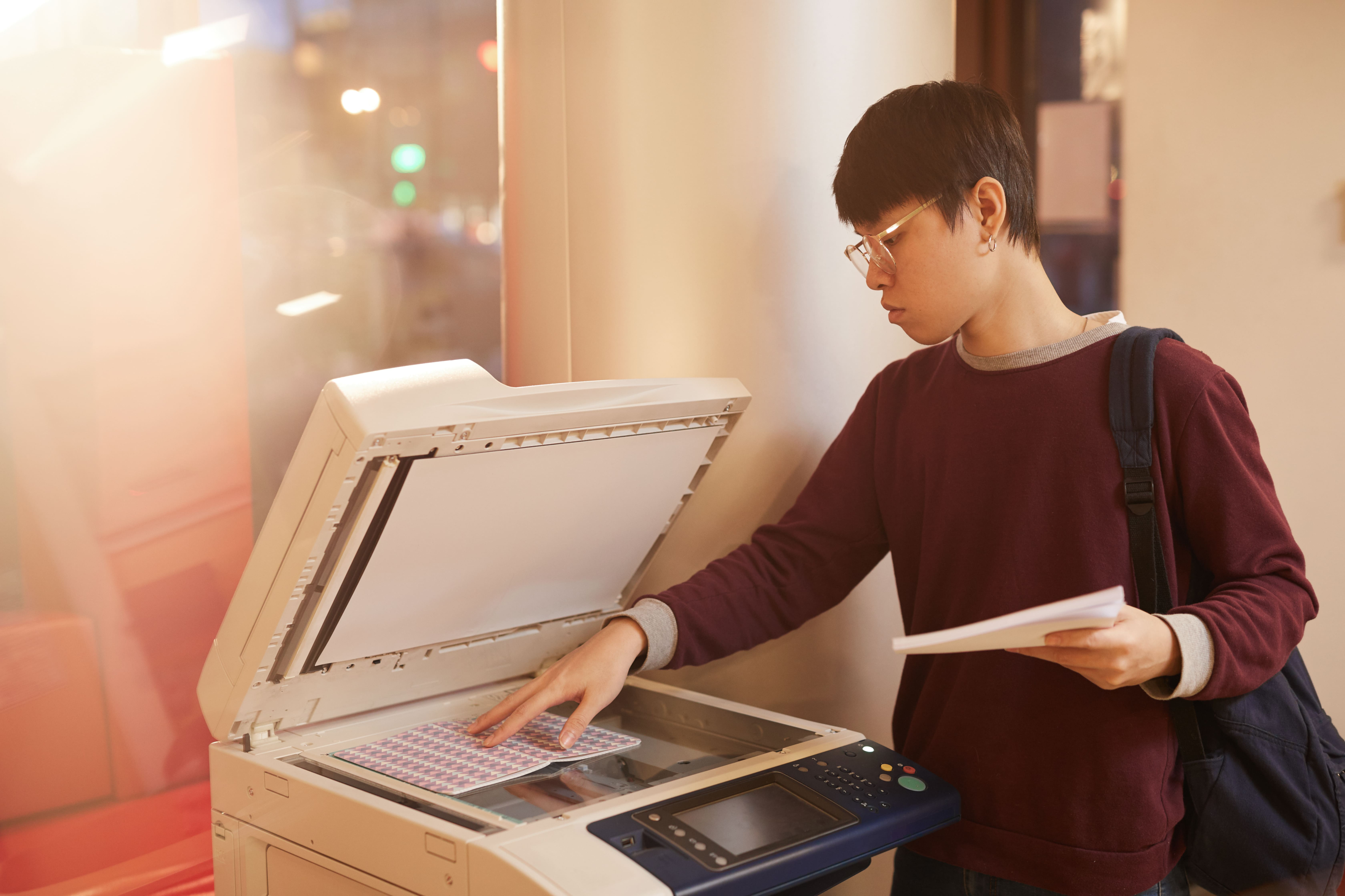 Is it cheaper to buy a refurbished multifunction printer than a new photocopier?