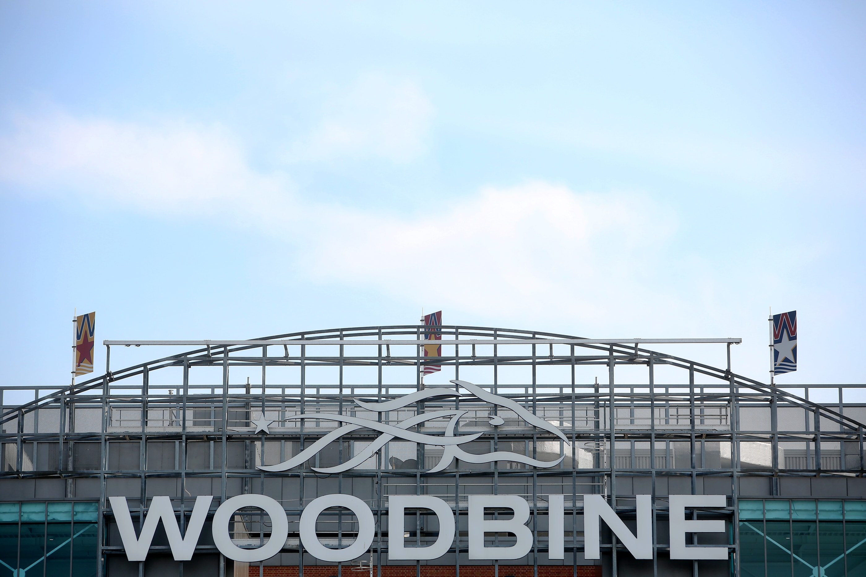 A view of the Woodbine sign on the outside of the racetrack.