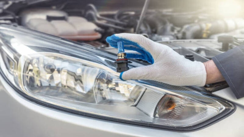 A professional replacing LED lights in a car. 