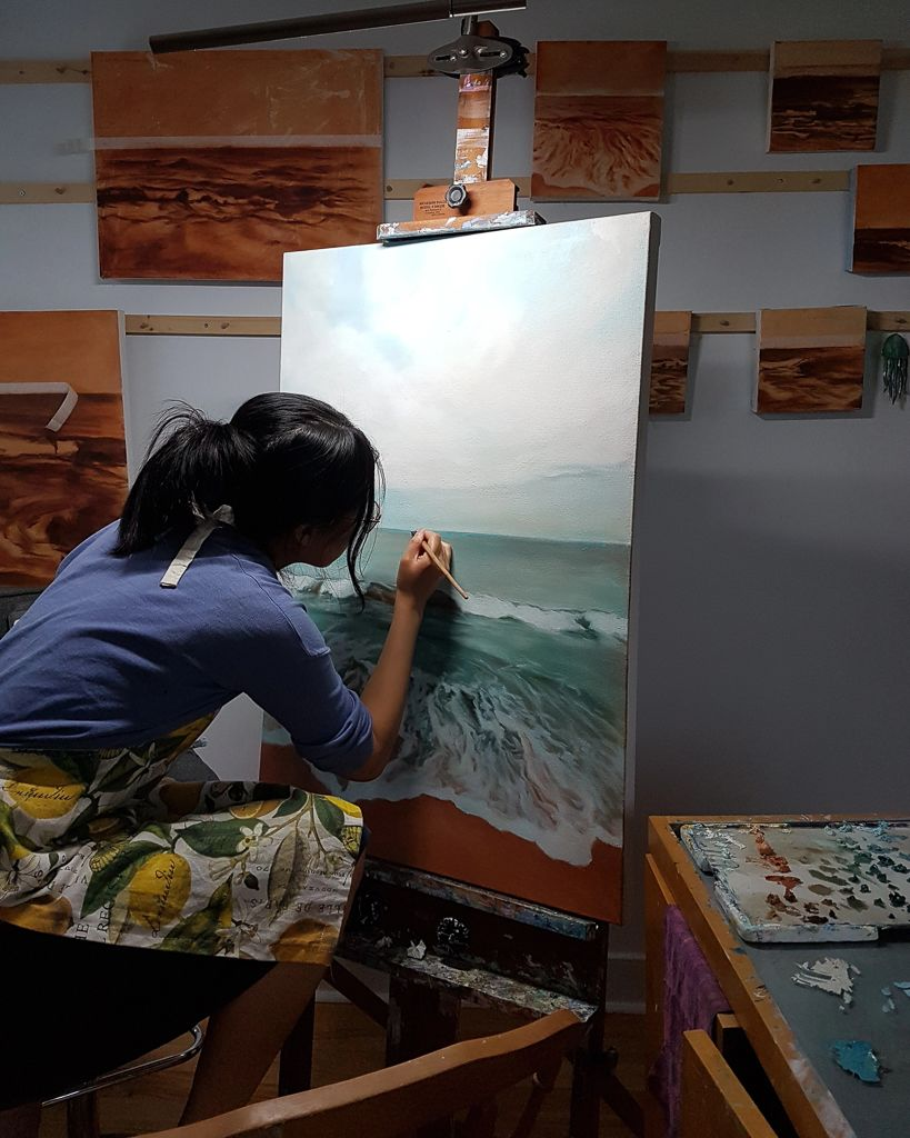 Artterra Artist, Grace Lane Smith in action. Painting one of her landscape paintings.