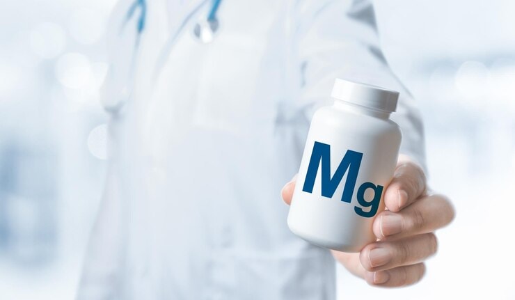 Doctor holding magnesium supplement