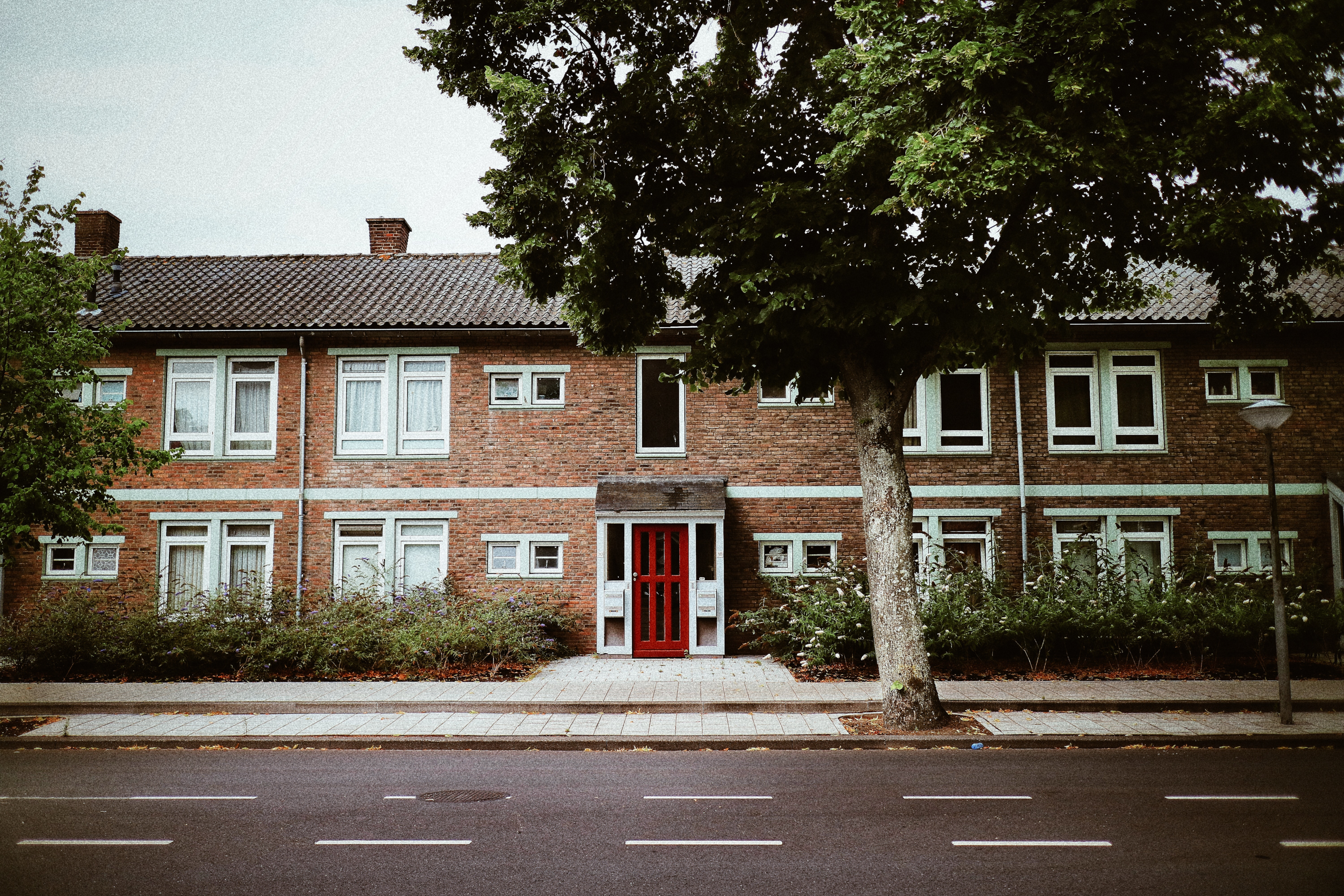 Front of a concrete apartment building