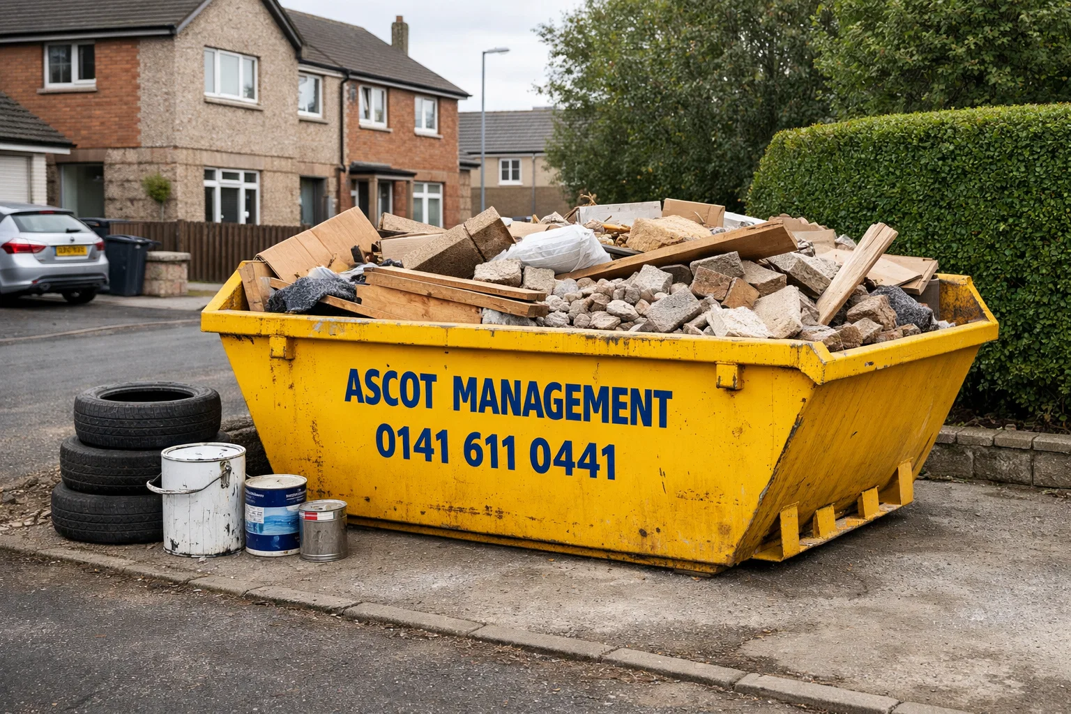 Ascot Management skip correctly filled with approved waste, with restricted items placed separately.