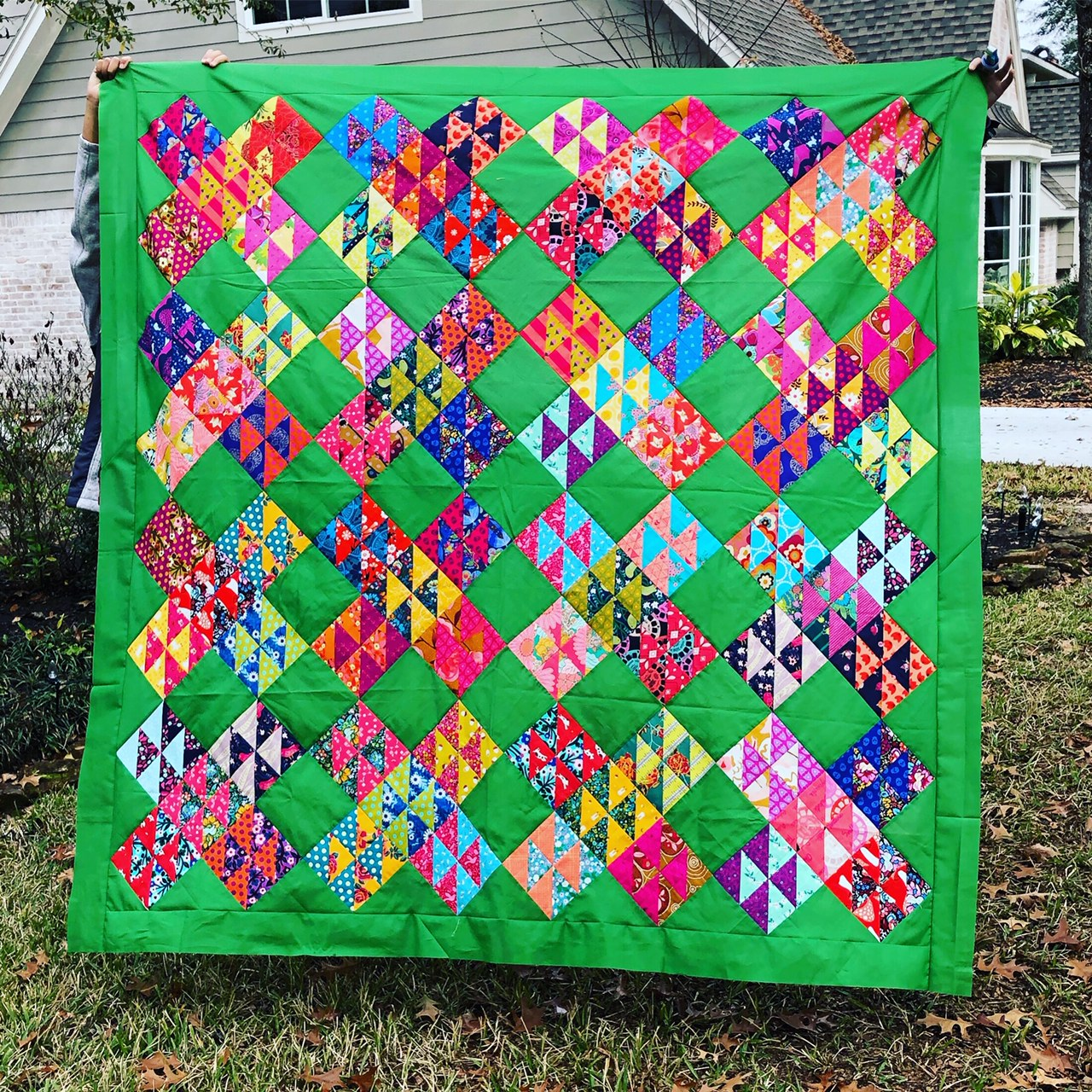 Hello Houston quilt by Rebecca Bryan, Bryan House Quilts. A half square triangle quilt pattern with different scraps. HST overload quilt pattern???