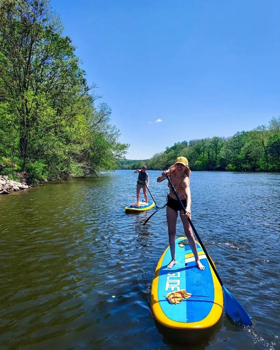 stand up paddle board with a carbon fiber sup paddle