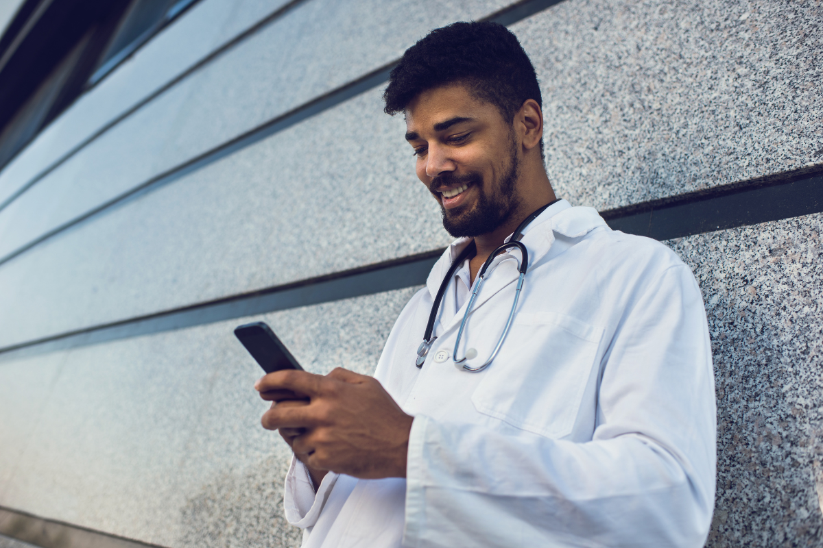 A phone screen displaying a sweet text message that will make him smile for hours.