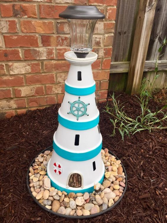 Solar terracotta pot lighthouse.