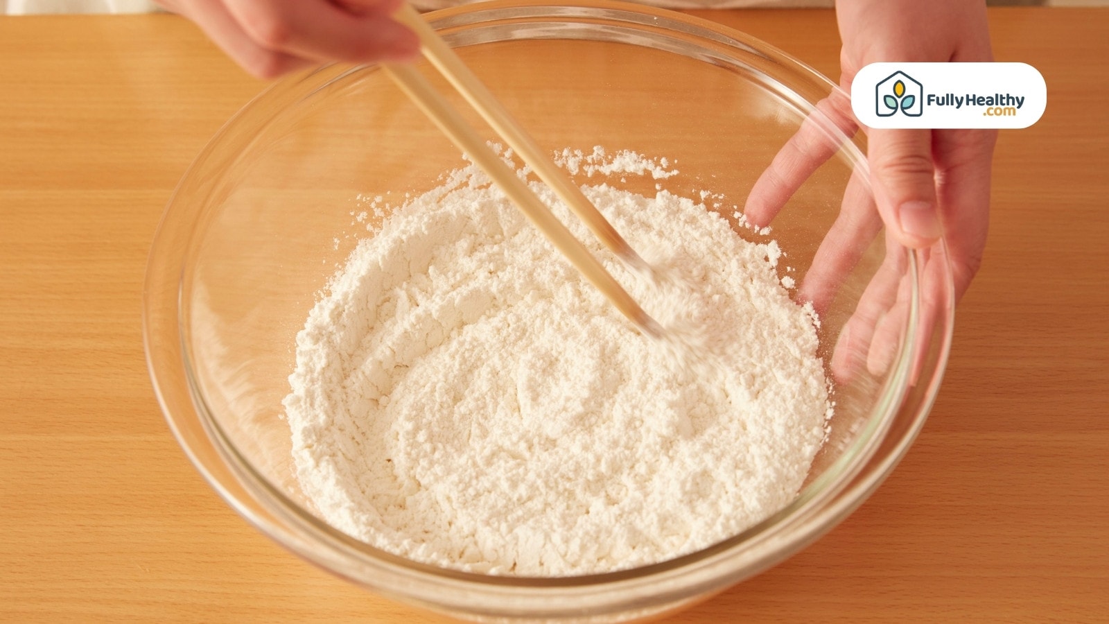 Glass jar of tartar sauce with dill and lemon wedges