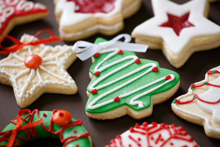 Christmas cookies in tree, star, and wreath shapes. 