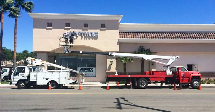 Anytime Fitness exterior sign installation in Ventura, CA. We have a fleet of boom trucks standing by.